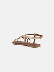 Flat sandal in genuine leather with crossed straps - GOLD