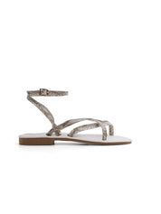 Flat sandal with crossed straps - BEIGE