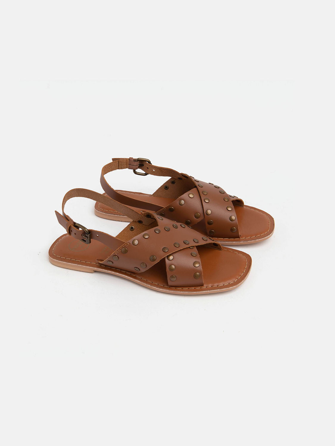 Genuine leather sandal with studded crisscross bands - LEATHER